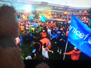 Baxterbear watching UNICEF flag waving at closing ceremony of Glasgow 2014